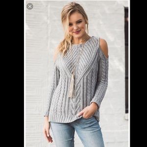 Gray cold shoulder sweater from Francesca’s